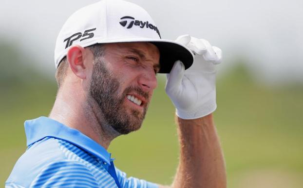 El estadounidense Dustin Johnson, en el campo de Erin Hills. /EFE