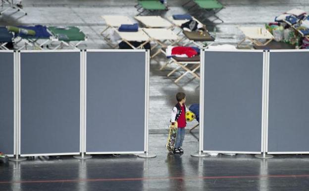 Un niño, a su llegada a Alemania.